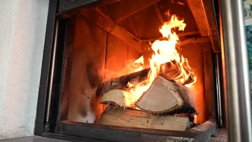 Roaring Flames in a Cozy Indoor Fireplace