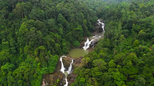 Waterfall in the Tropical Mountain Jungle