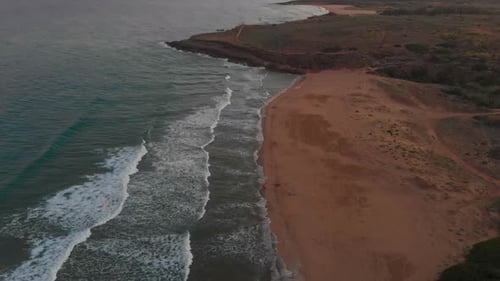Aerial view of pizzuta beach at sunset, Italy.