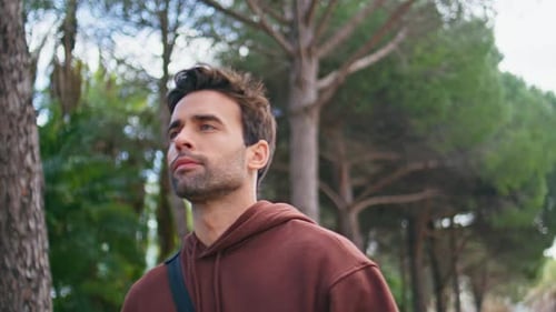 Pensive Man Walking Park Alone Closeup Handsome Athletic Guy Going Green City