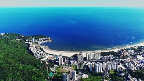 Aerial Top view of a transparent blue sea with beautiful waves at sunny day in summer. air of ocean