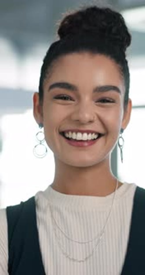 Face, creative and woman with smile in office for career pride, about us and journalist at agency