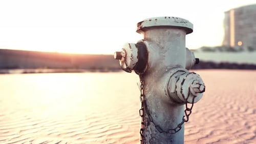 Old Hydrant on a Seaside Promenade