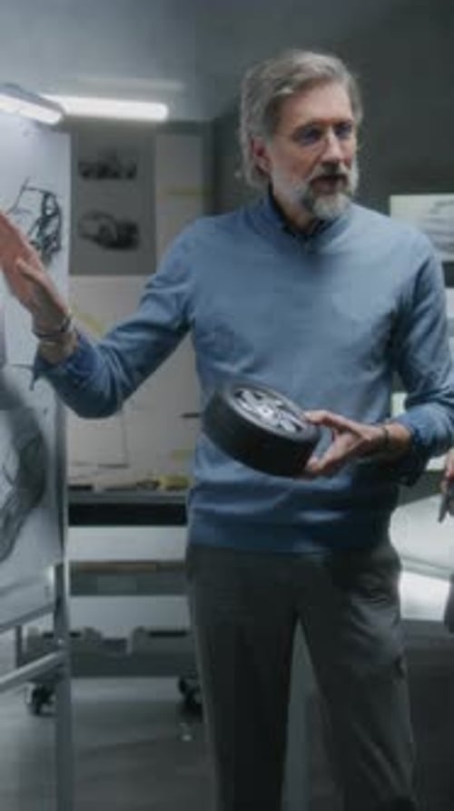 Designers Discussing Car Part Designs