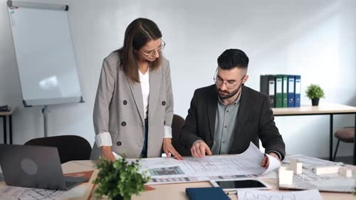 Man Woman Architecture Colleagues Discussion Project Paper Draft Construction Building Design Plan