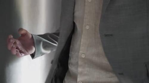 Man Buttons Suit Jacket Inside