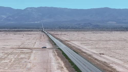 Endless Road to Horizon Through the Desert Valley Aerial View of a Desert