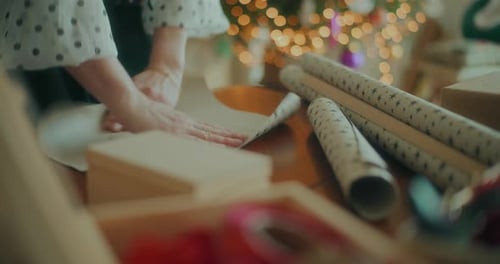Wrapping Christmas Gifts in Cozy Home Setting