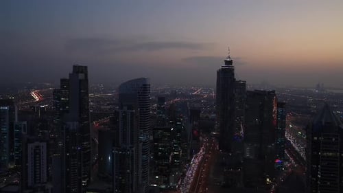 Night video Skyscrapers and towers in the atmosphere of the city of Dubai