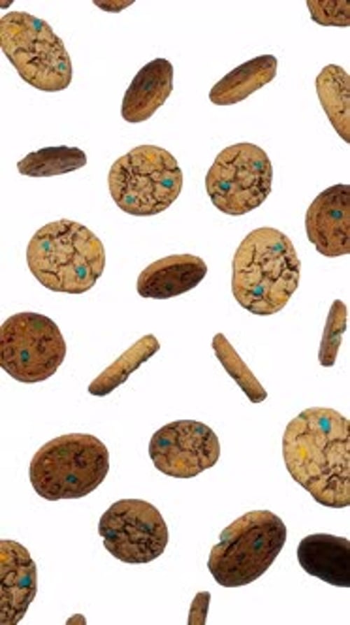 Falling Chocolate Chip Cookies with Candies Background