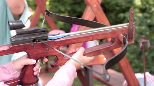 shooting with the crossbow for leisure with people stock video stock footage
