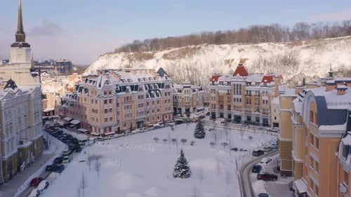 Aerial View of City Square in the Snowy Winter Day