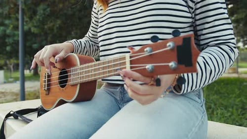 Hands Girl Practices First Lessons Of Ukulele Musical Stringed Instrument