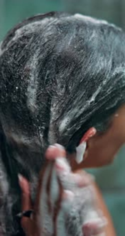 Woman Washing Hair in Shower Close Up