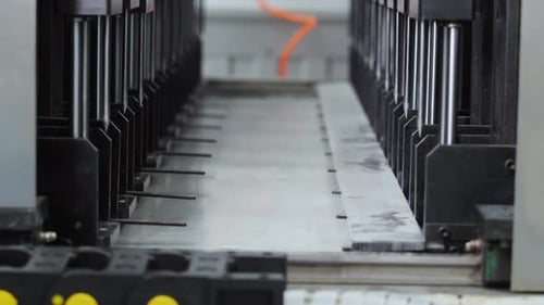 Closeup View of the Operation of the Mechanical Component of a Factory Machine