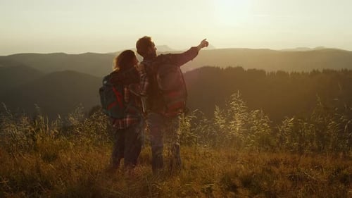Romantic Hiking Couple Enjoying Sunset Adventure