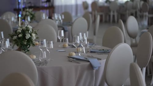 Wedding reception tables prepared for celebration event