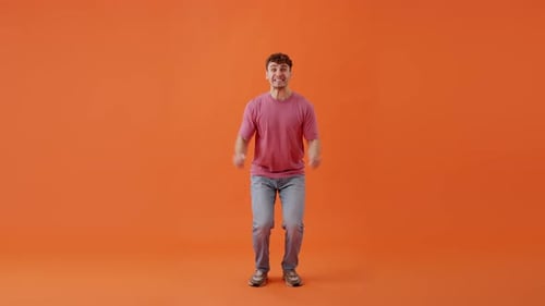 Man Joyfully Dancing in Studio