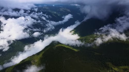 Alpine Landscape Green Mountains Misty Valleys and a Drone