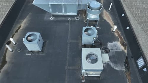 Air Conditioning Units on Commercial Building Roof Aerial View