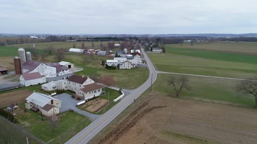 Aerial View of Amish Countryside on a Winter Day as Seen by a Drone