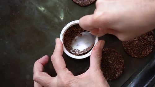 Molding Homemade Cookies Into Oven Tray. Close Up
