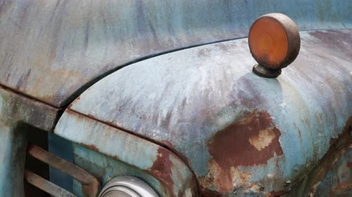 Rusty vintage blue truck close up