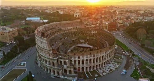 Aerial View of Iconic Ancient Arena of Colosseum at Sunset Flavian Amphitheatre in the Heart of Rome