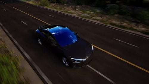 Aerial view of a self driving autonomous electric car driving along a countryside road
