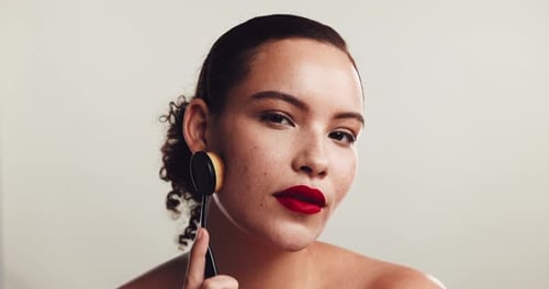 Woman, foundation and sponge for face in studio with application, test and beauty by white