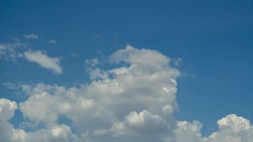 Wispy clouds form and roll on in this cloudscape time lapse