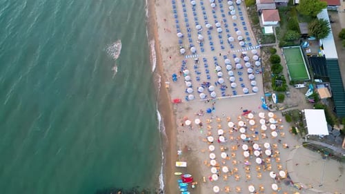 Beach with umbrellas and loungers