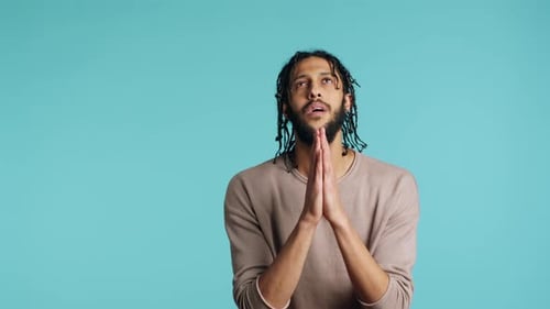 Pious Man Praying to His God Asking for Forgiveness Feeling Desperate Studio