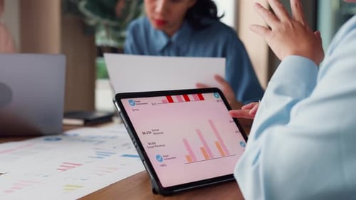 Asia people meeting brainstorming ideas about new paperwork project in office.