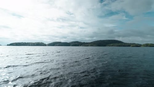 Beautiful Natural Landscape With Lake View From Water In Cloudy Day Weekend Trip In Nature