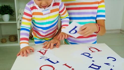 Young Children Learn Alphabet Letters With Fun Flashcards