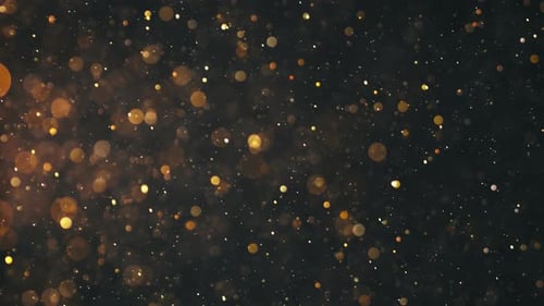 Sparkling Gold Particles Drifting on Dark Background