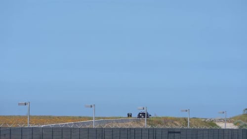 airplane touching down on runway