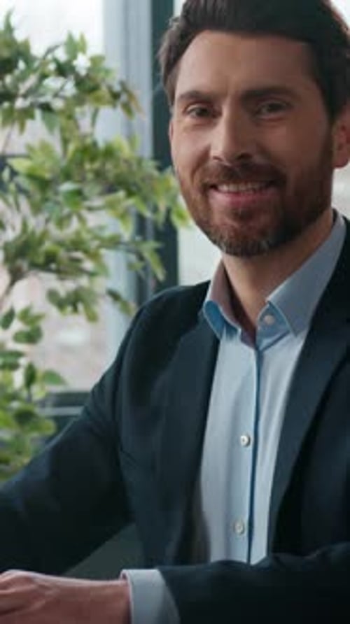 Caucasian Businessman Typing Laptop Office Smiling Looking at Camera Portrait Professional Male