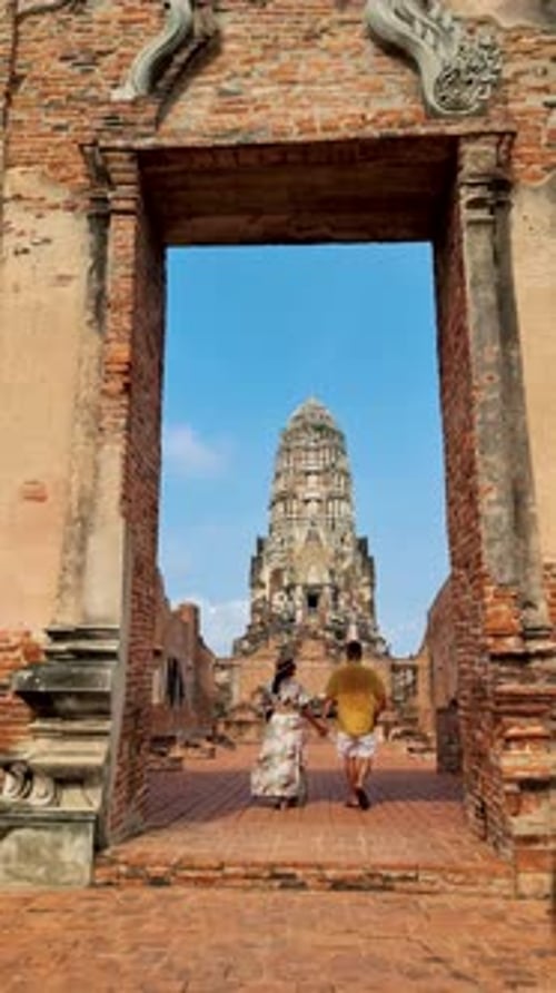 Ayutthaya Thailand Wat Ratchaburana Couple Men and Women with a Hat Visiting Ayyuthaya Thailand