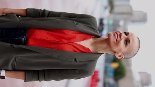 happy mature woman in the rain city