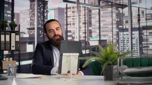 Man Talks During a Video Call in Office