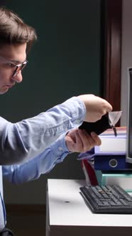 Vertical Video Closeup Stressed Office Worker Checking Empty Wallet at Night in Office