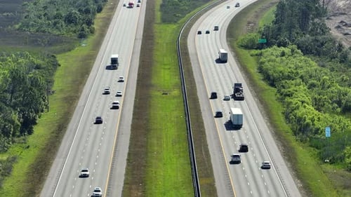 Top View of Mulitlane American Highway with Rapid Driving Cars During Rush Hour in Sarasota County