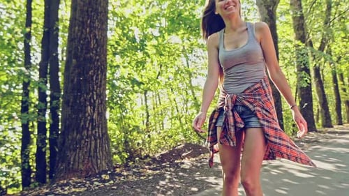 Young Sporty Woman Riding on the Rollers