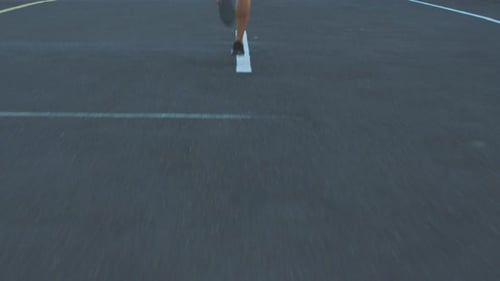 Running, fitness and exercise with a woman athlete training on a run and workout for health