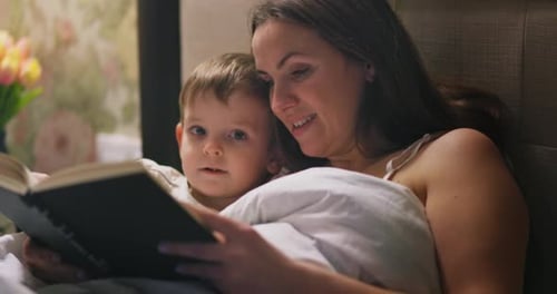 Mother Reading a Bedtime Story to Her Child