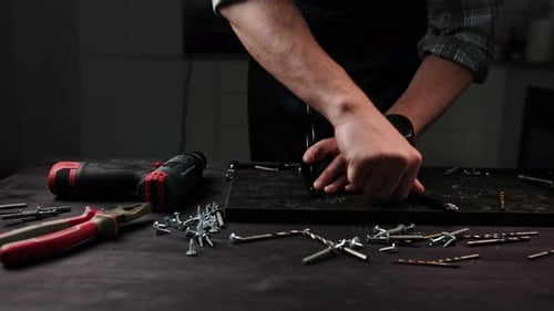 Carpenter Making Handmade Shelves for Home
