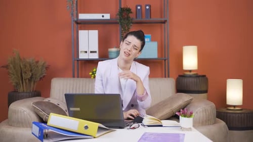 Home office worker young woman looking emotional at camera.