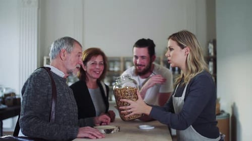 Couple Shopping at Zero Waste Store with Granola